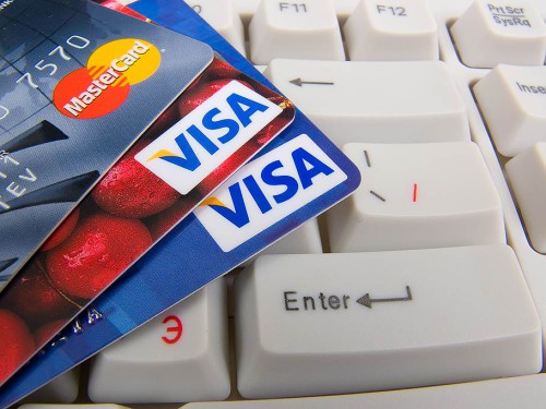 Пластикові картки Visa і MasterCard